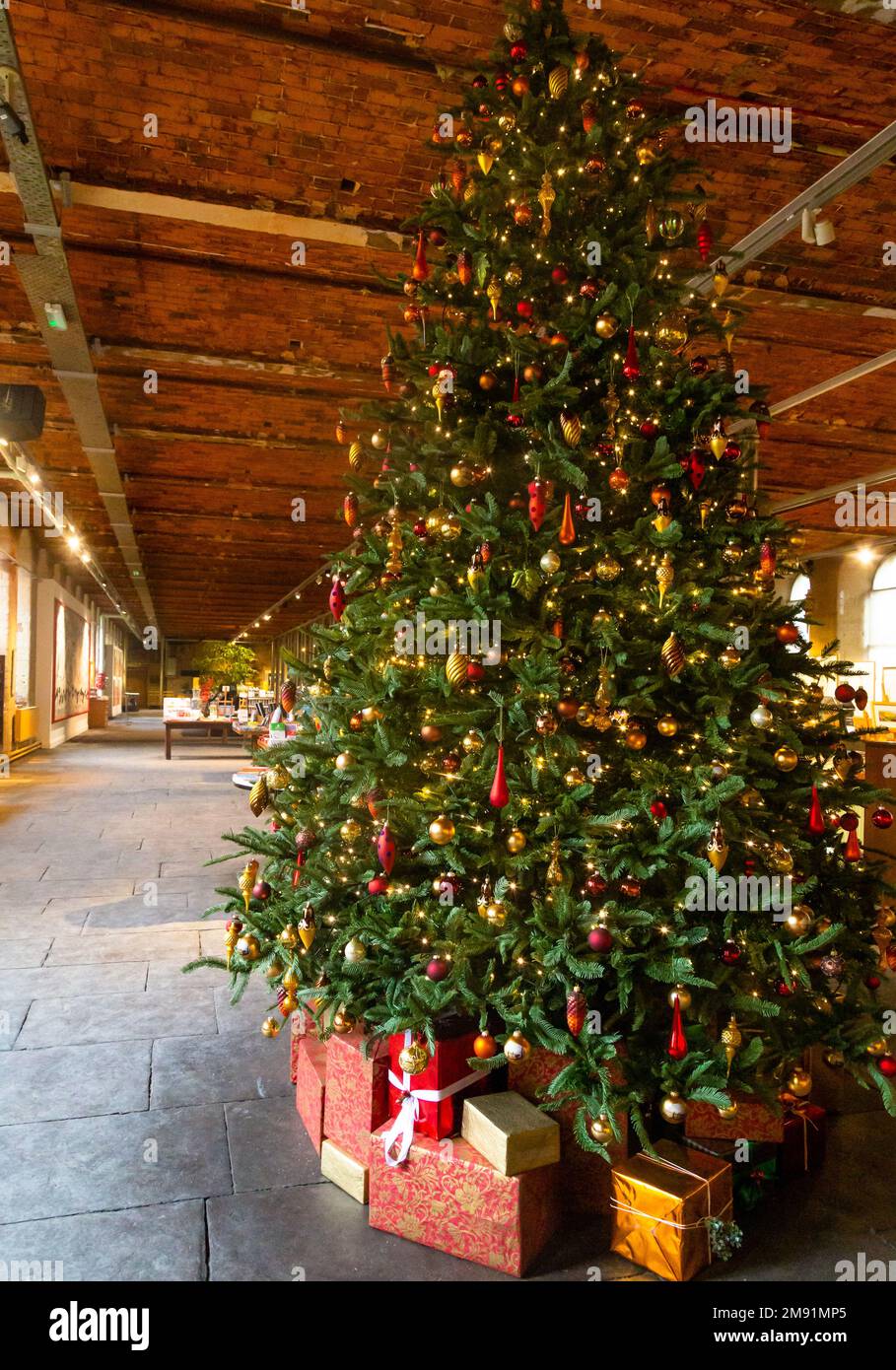 A decorated Christmas Tree in Salts Mill, Saltaire, Yorkshire. Stock Photo