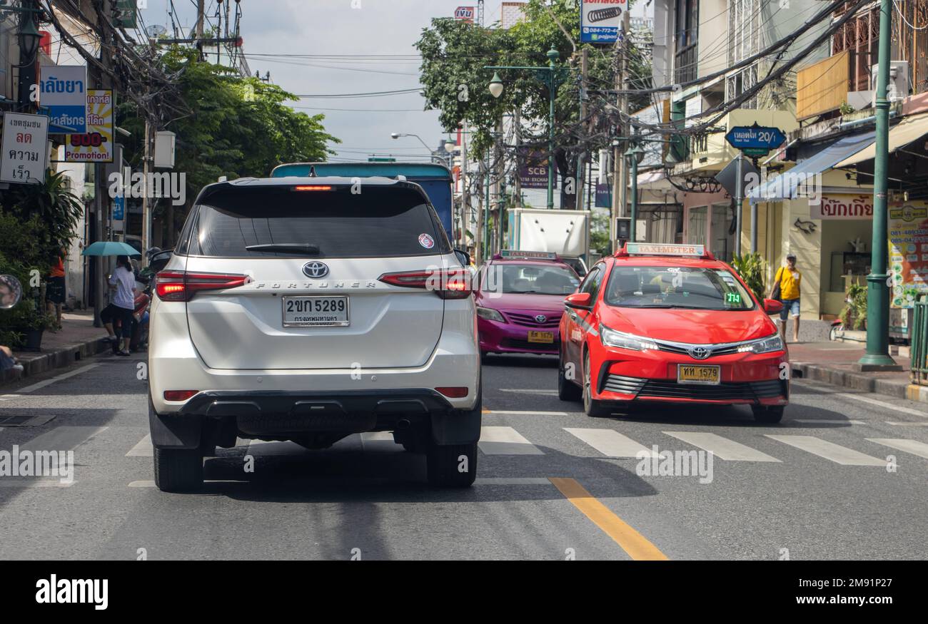 Cars drive over the pedestrian crossing in the city center Stock Photo ...
