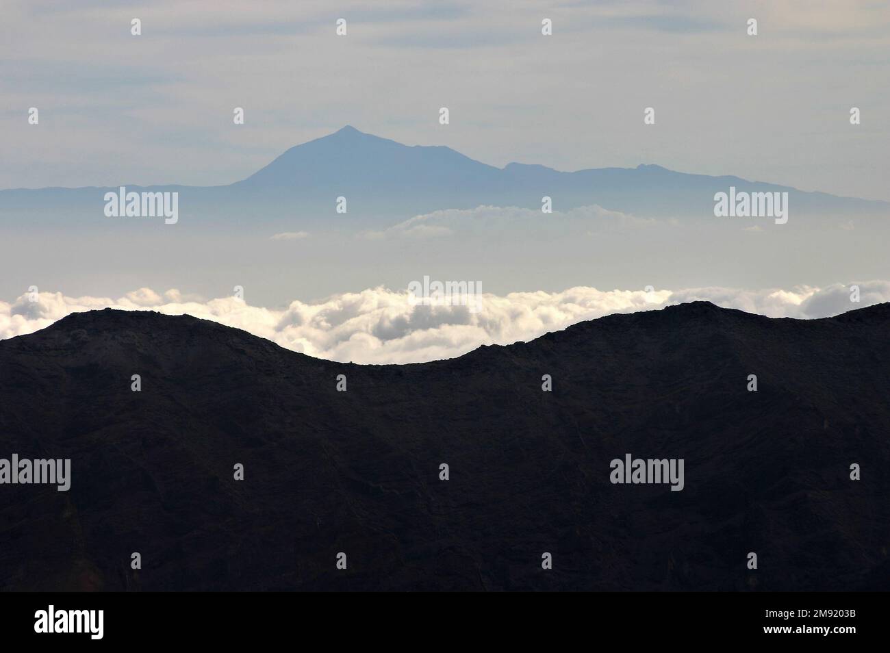 View from Roque de muchachos mountain on La Palma Canary Islands over to Mount Teide on Tenerife Stock Photo