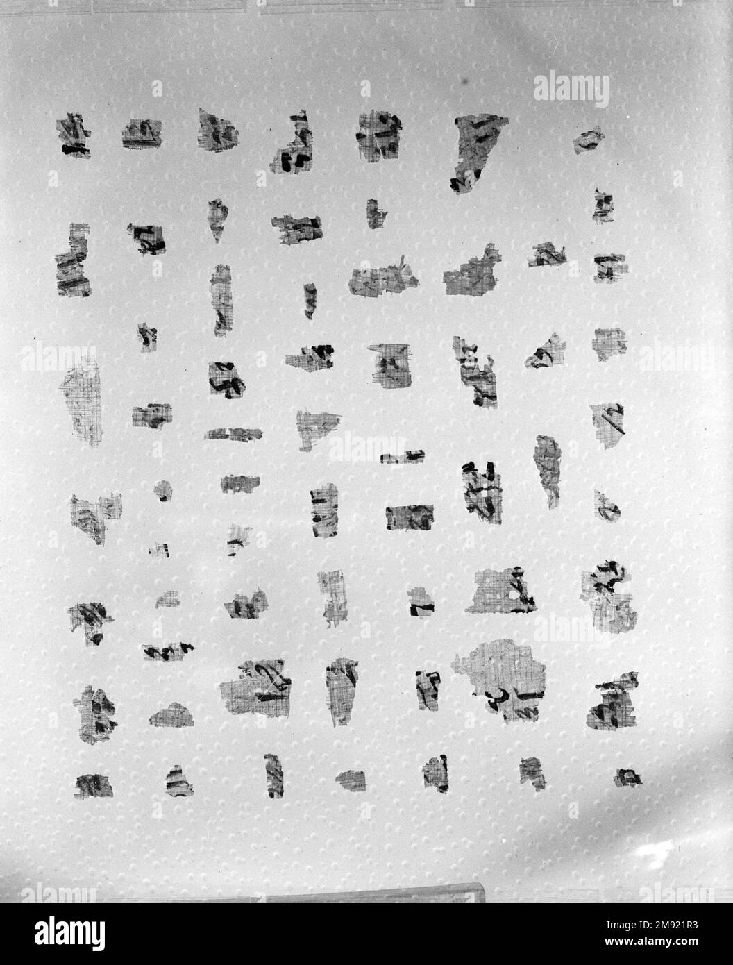 Portion of a Historical Text Portion of a Historical Text, ca. 1809-1743 B.C.E. Papyrus, ink, 35.1446a-e: 11 1/2 × 71 5/8 in. (29.2 × 182 cm).  When complete, the papyrus to which this fragment belonged measured almost seven feet long. The texts are written in a cursive form of hieroglyphs called hieratic. Differences in handwriting and in the historical events described demonstrate that different scribes added new inscriptions over several generations. The most important text recounts the efforts of a Thirteenth Dynasty Theban noblewoman named Senebtisi to establish legal ownership of ninety- Stock Photo
