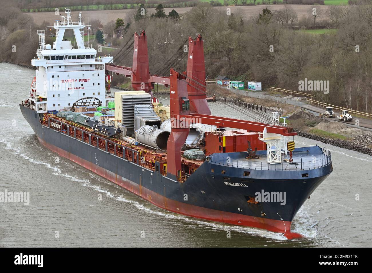 General Cargo Ship DRAGONBALL passing the Kiel Canal underway from Korea (south) to St. Petersburg Stock Photo