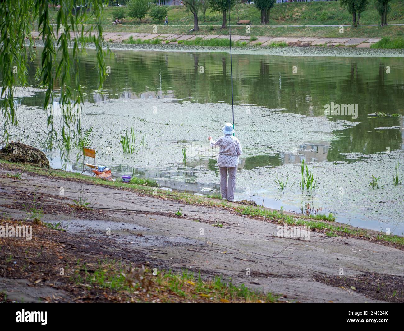 Fisherman fishing rod chair hi-res stock photography and images