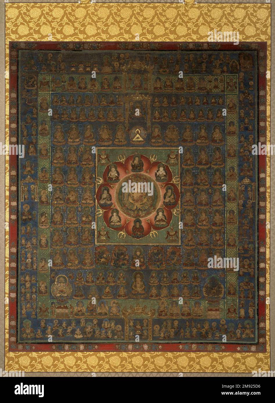 Taizō-kai Mandara Taizō-kai Mandara, 14th century. Opaque watercolor, ink and gold on silk, overall: 84 1/2 x 50 1/8 in. (214.6 x 127.3 cm);.  The mandala (or mandara, in Japanese) is a diagrammatic tool used by Buddhists to guide their meditation and prayer. Most mandalas direct the viewer to travel mentally on a prescribed path, stopping to contemplate and address each figure depicted. This early Womb World (Taizō-kai) mandala is part of a pair that would have been displayed on opposite walls of a temple of Vajrayana (esoteric) Buddhism, representing different but equally viable approaches t Stock Photo