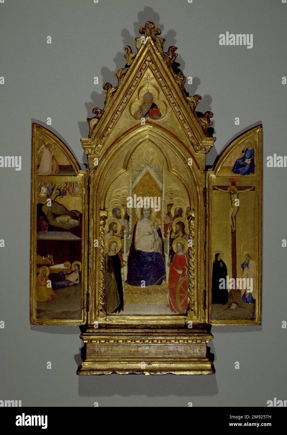 Triptych: Madonna with Saints and Christ Blessing (Center); The Nativity and the Annunciate Angel (Left Wing); Crucifixion and the Virgin Annunciate (Right Wing) Maso di Banco (Italian, Florentine School, 1341-1346). Triptych: Madonna with Saints and Christ Blessing (Center); The Nativity and the Annunciate Angel (Left Wing); Crucifixion and the Virgin Annunciate (Right Wing), ca. 1336. Tempera and tooled gold on poplar panel in original engaged frame, Center panel: 30 1/8 x 11 3/4 in. (76.5 x 29.8 cm).  This folding triptych (a painting on three panels) is filled with multiple figures and sce Stock Photo