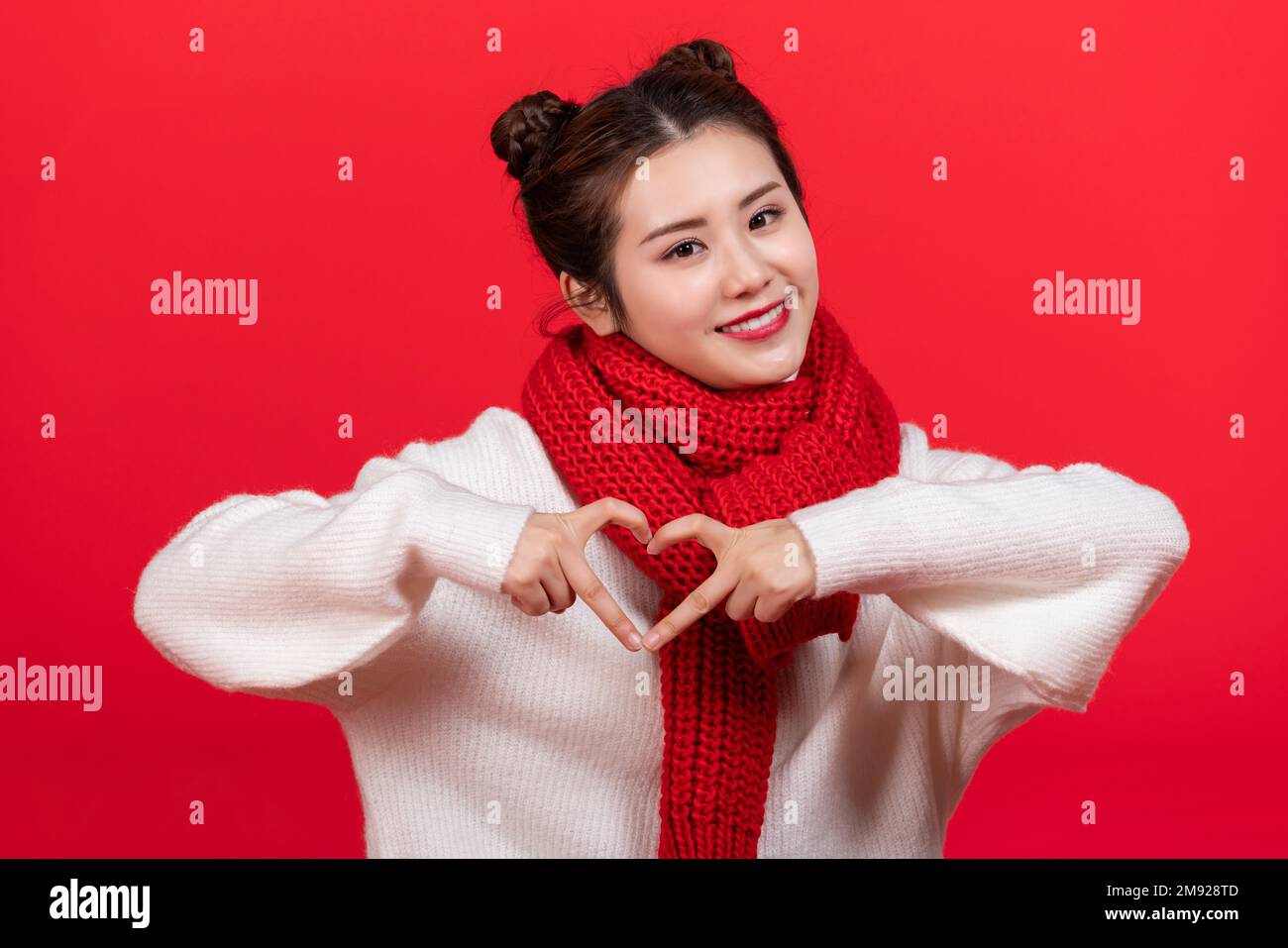 Happy young woman with a gift Stock Photo - Alamy