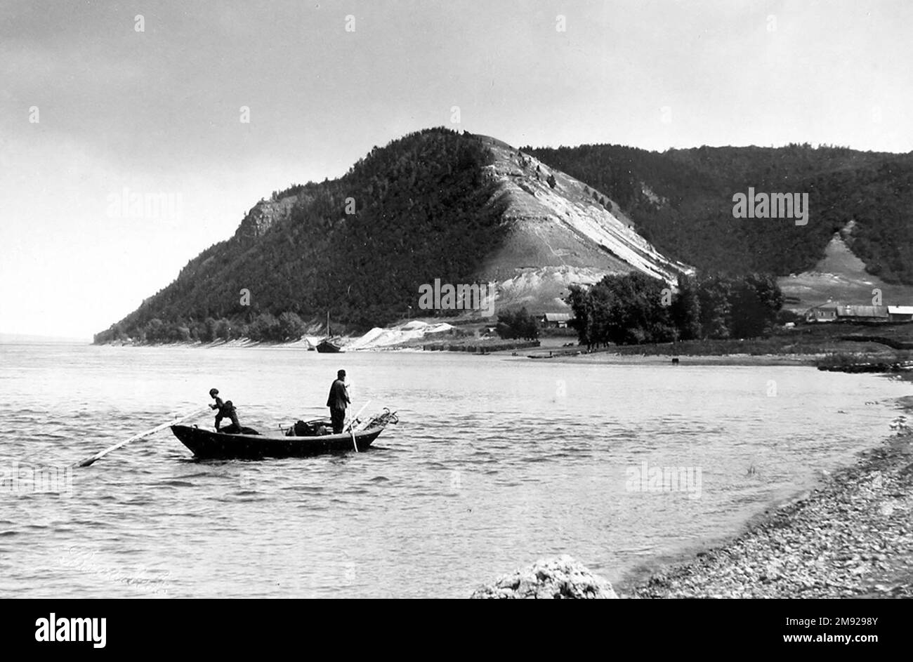 View of Bald Mountain and fishermen in foreground near Morkvashi village, Zhiguli mountains, Samarskaya Luka, Russia ca.  before 1918 Stock Photo
