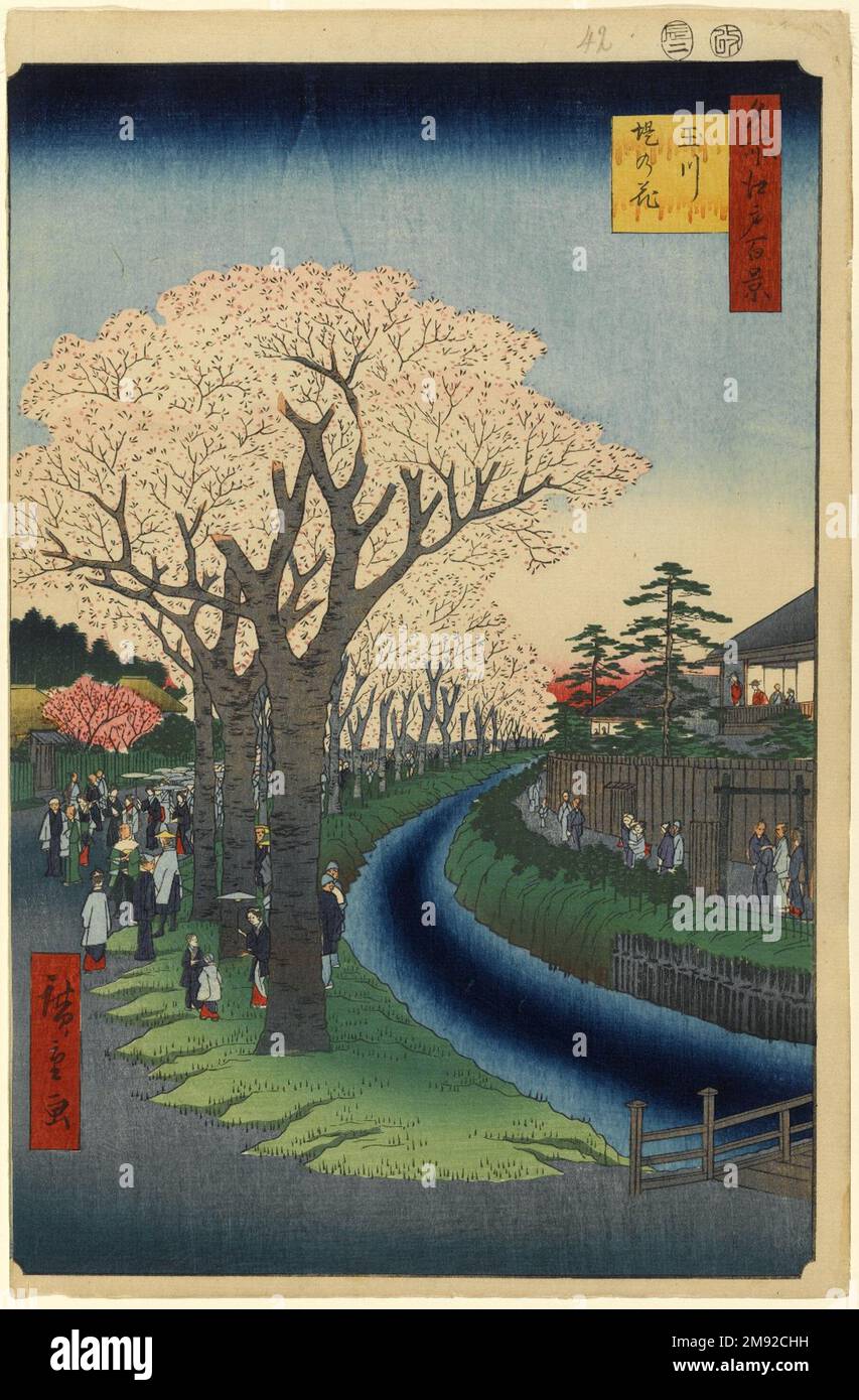 Blossoms on the Tama River Embankment, No. 42 in One Hundred Famous Views of Edo Utagawa Hiroshige (Ando) (Japanese, 1797-1858). , 2nd month of 1856. Woodblock print, 14 5/16 x 9 5/16in. (36.4 x 23.7cm).  The 'Tama River,' actually the Tama River Aqueduct, carried much of the drinking water for the city of Edo along a thirty-mile course. Hiroshige's springtime view vividly conveys a freshness and vitality befitting this lifeline. The cherry trees were planted along much of the embankment in the 1730s. The placement was not only aesthetic but also practical: the trees' roots strengthened the ba Stock Photo