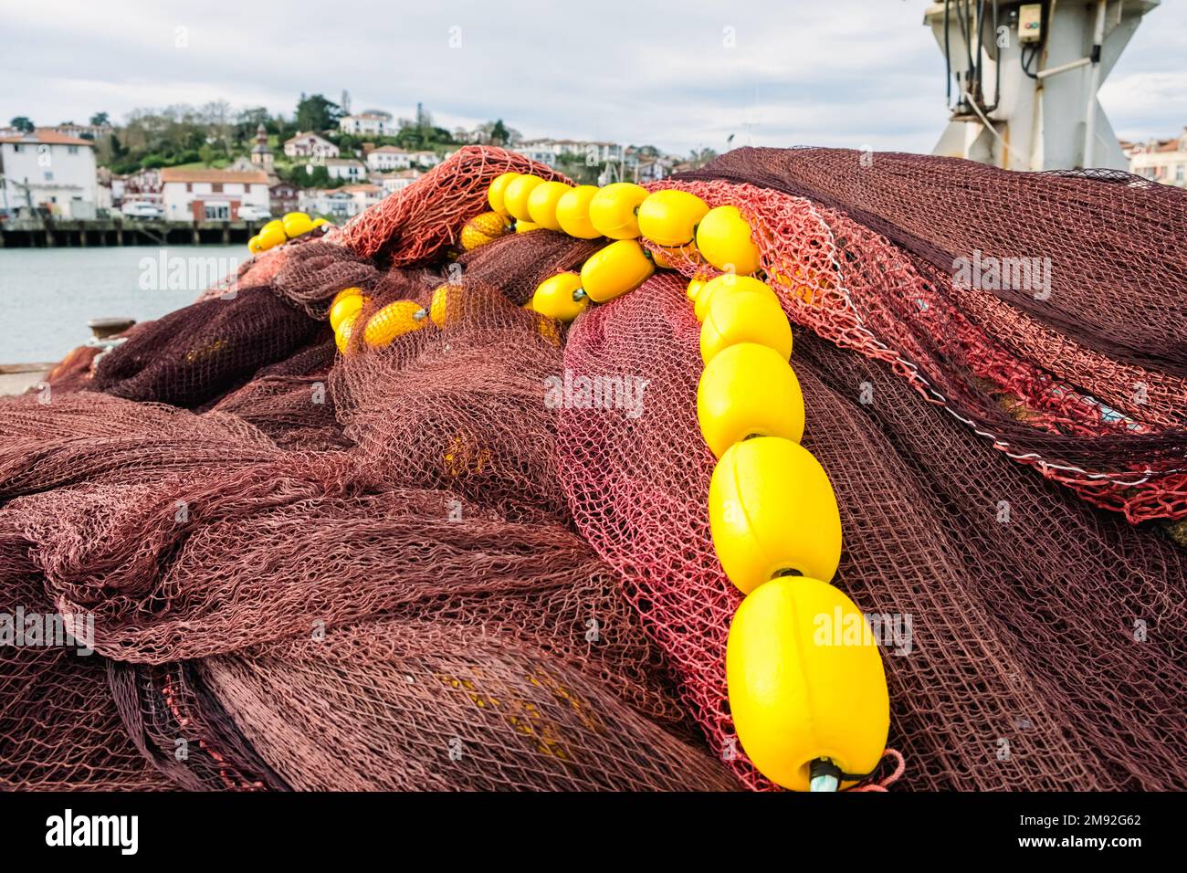 Mend fish nets hi-res stock photography and images - Page 3 - Alamy