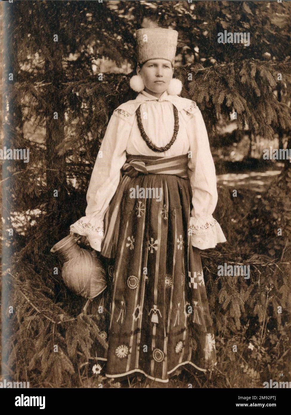 Young Russian woman from  South Russia, Kursk province dressed in traditional folk dress ca.  1900 Stock Photo