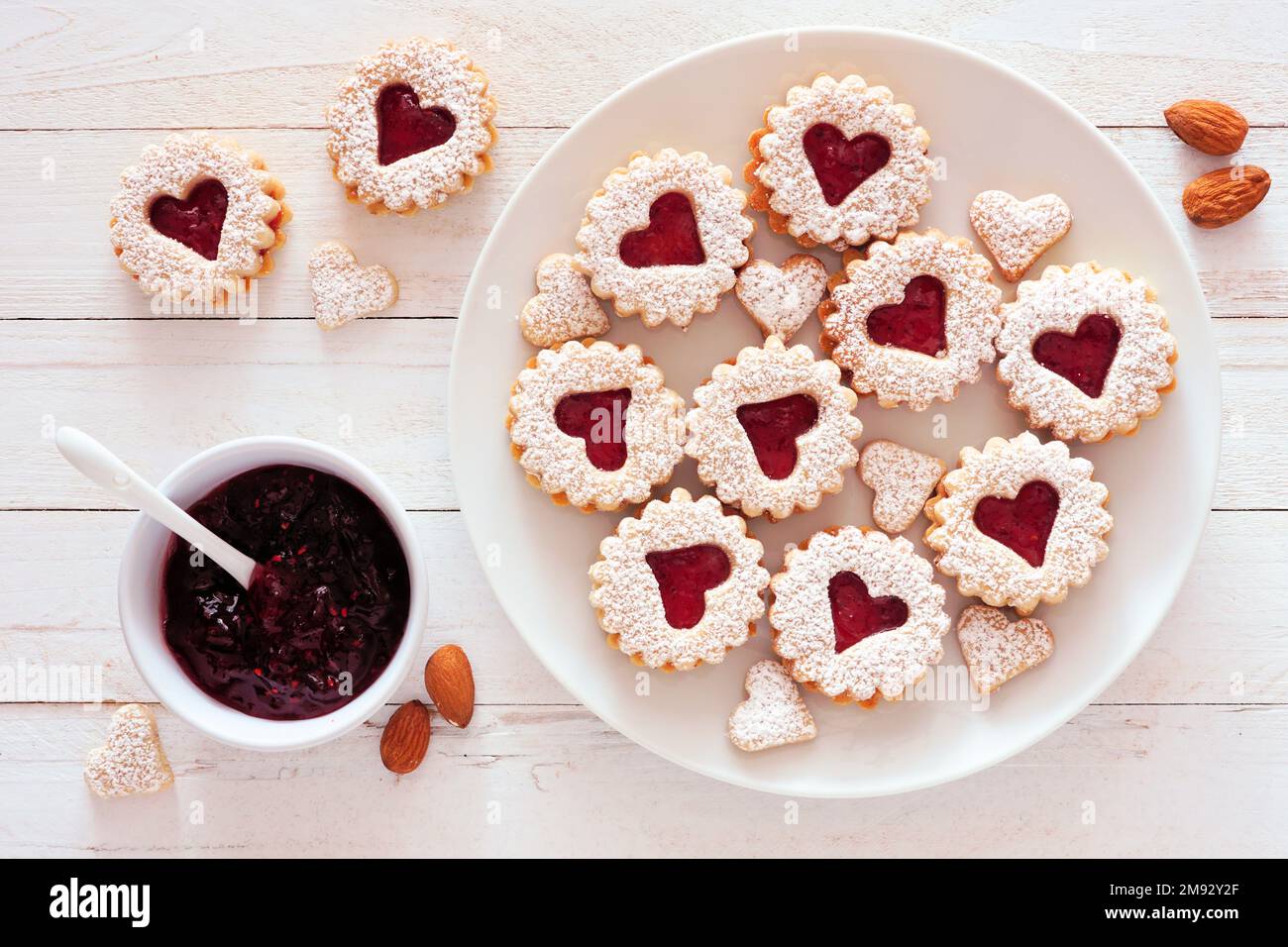 Valentines Day jam filled cookies with heart shapes. Top view table