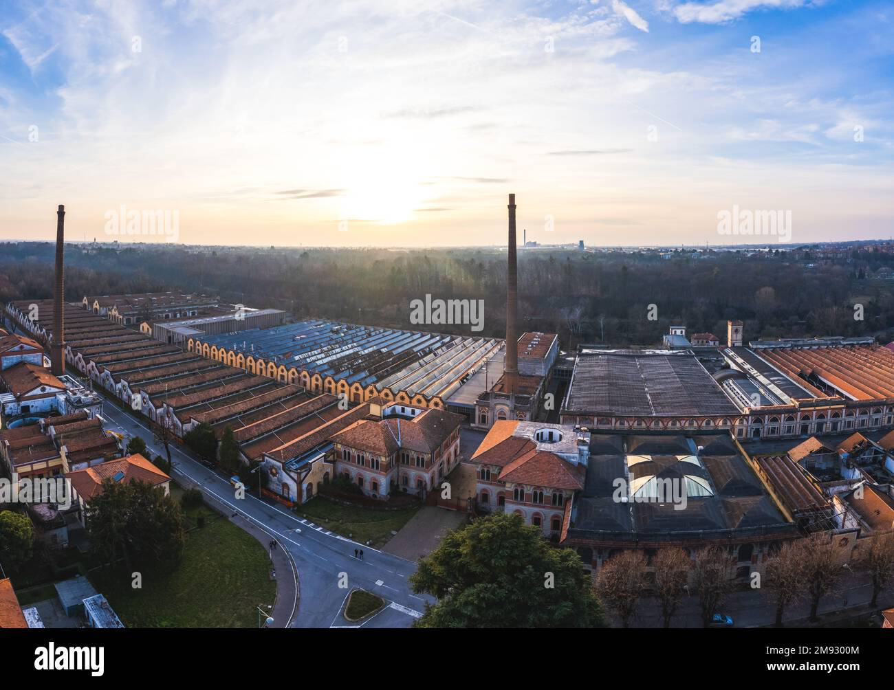 Aerial view of historic worker village of Crespi d'Adda during sunset, Lombardy, Italy Stock Photo