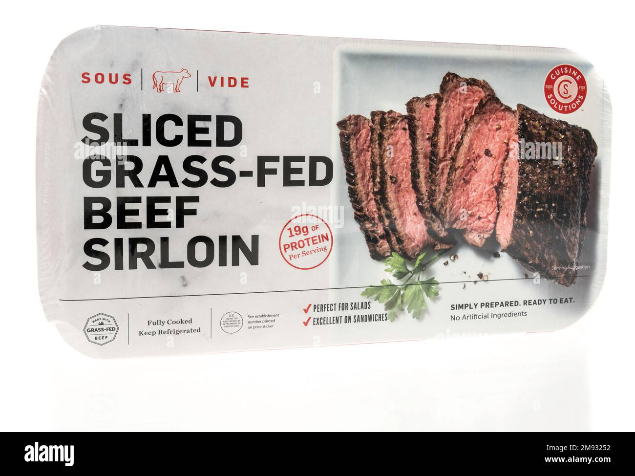 Winneconne, WI - 8 January 2023: A package of sous vide sliced grass fed beef sirloin  on an isolated background. Stock Photo