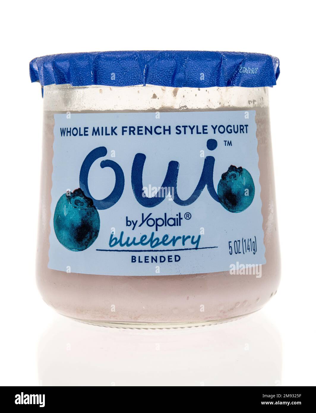 Winneconne, WI - 8 January 2023: A package of Oui whole milk French style yogurt with blueberry yogurt on an isolated background. Stock Photo