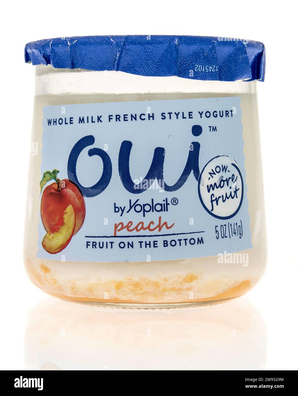 Winneconne, WI - 8 January 2023: A package of Oui whole milk French style yogurt with peach yogurt on an isolated background. Stock Photo