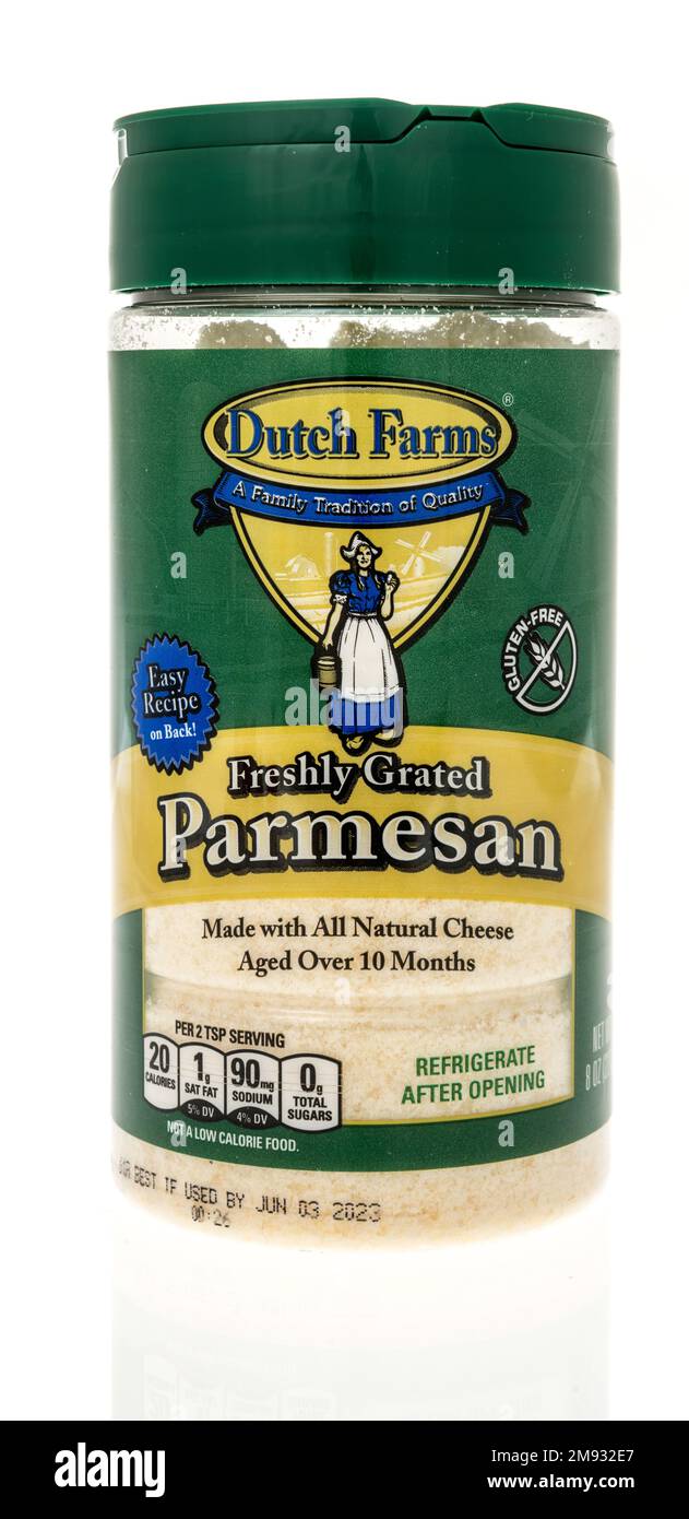 Winneconne, WI - 8 January 2023: A package of Dutch Farms freshly grated Parmesan cheese on an isolated background. Stock Photo