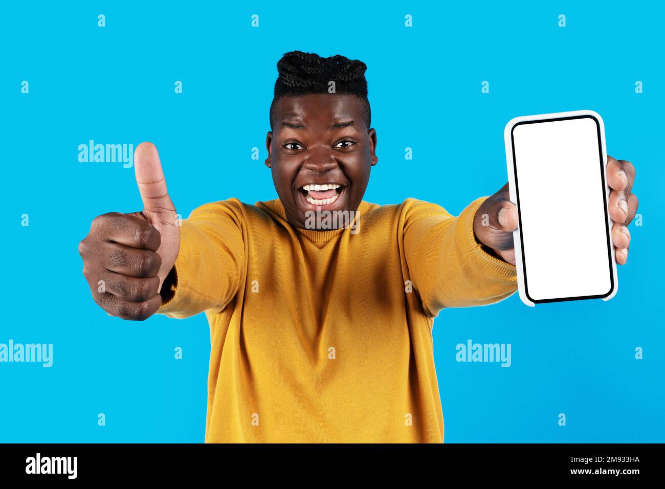 Presenting black man gesturing hi-res stock photography and images - Alamy