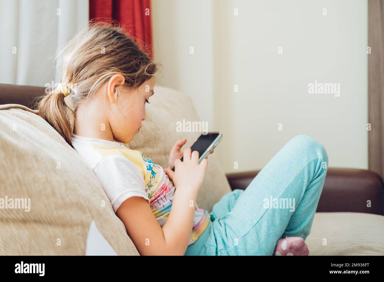 Little girl using computer hi-res stock photography and images - Alamy
