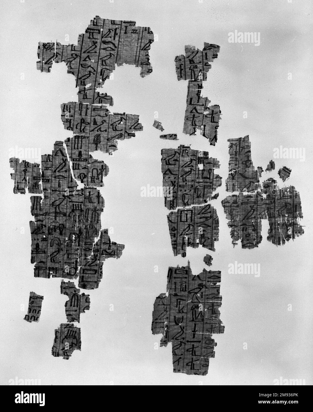 Fragments from a Book of the Dead Fragments from a Book of the Dead, ca. 1539-1190 B.C.E. Papyrus, ink, Glass: 12 3/16 x 13 1/2 in. (31 x 34.3 cm).   Egyptian, Classical, Ancient Near Eastern Art ca. 1539-1190 B.C.E. Stock Photo