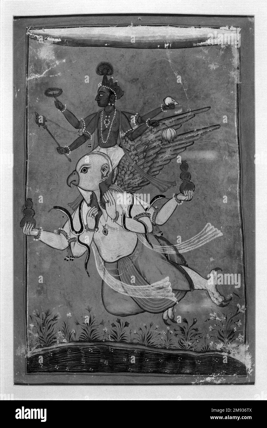 Vishnu on Garuda Indian. Vishnu on Garuda, ca. 1725 or earlier. Opaque watercolor, silver, and gold on paper, sheet: 8 11/16 x 5 3/4 in. (22.1 x 14.6 cm).  The Hindu god Vishnu resides in a heavenly realm, but when humankind requires his help, he descends to earth to save the day, riding on the back of a part-man, part-eagle creature named Garuda. Although Vishnu’s blue color is not explained in Hindu scriptures, several Hindu pundits have suggested that his color reflects his home above the clouds. Vishnu is also closely associated with the primordial ocean that existed before the gods create Stock Photo