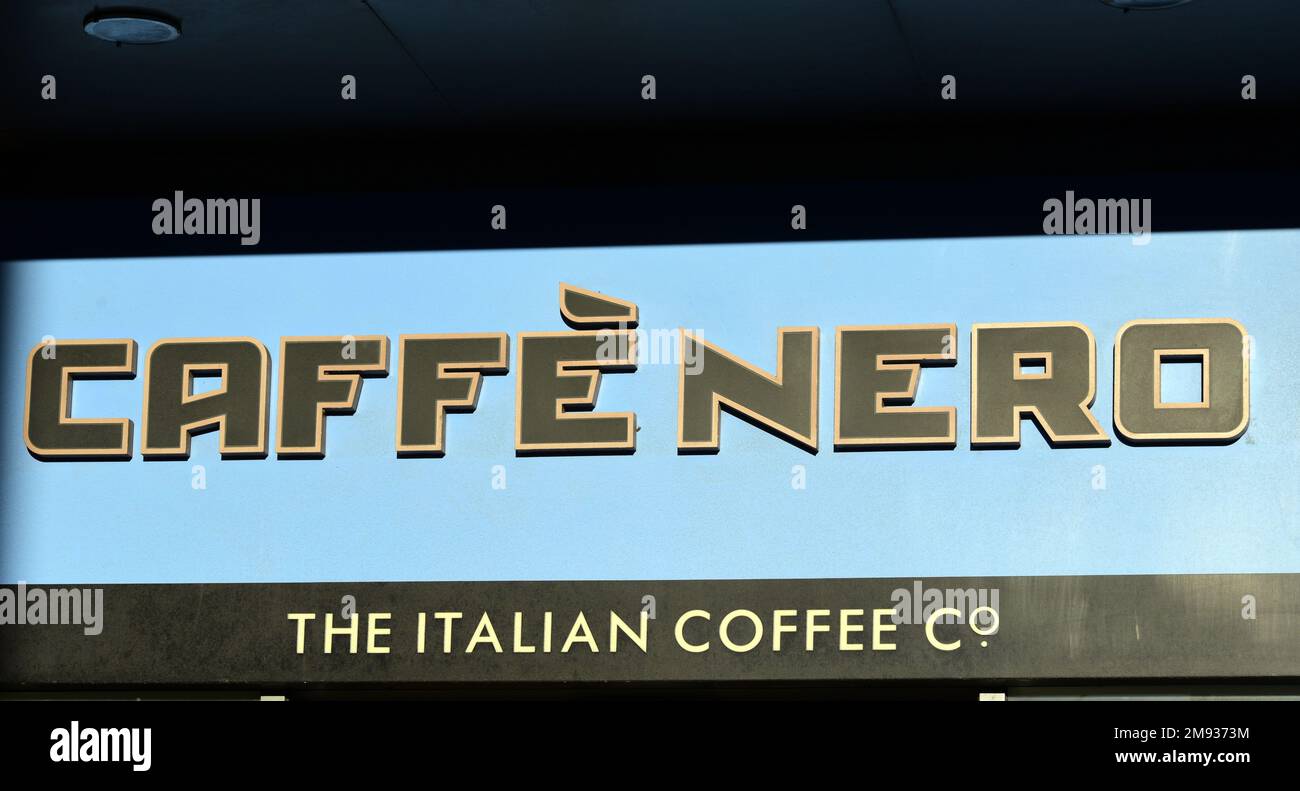 Caffè Nero sign, an Italian style British coffee house, in Market Street, Manchester, England, UK. Stock Photo