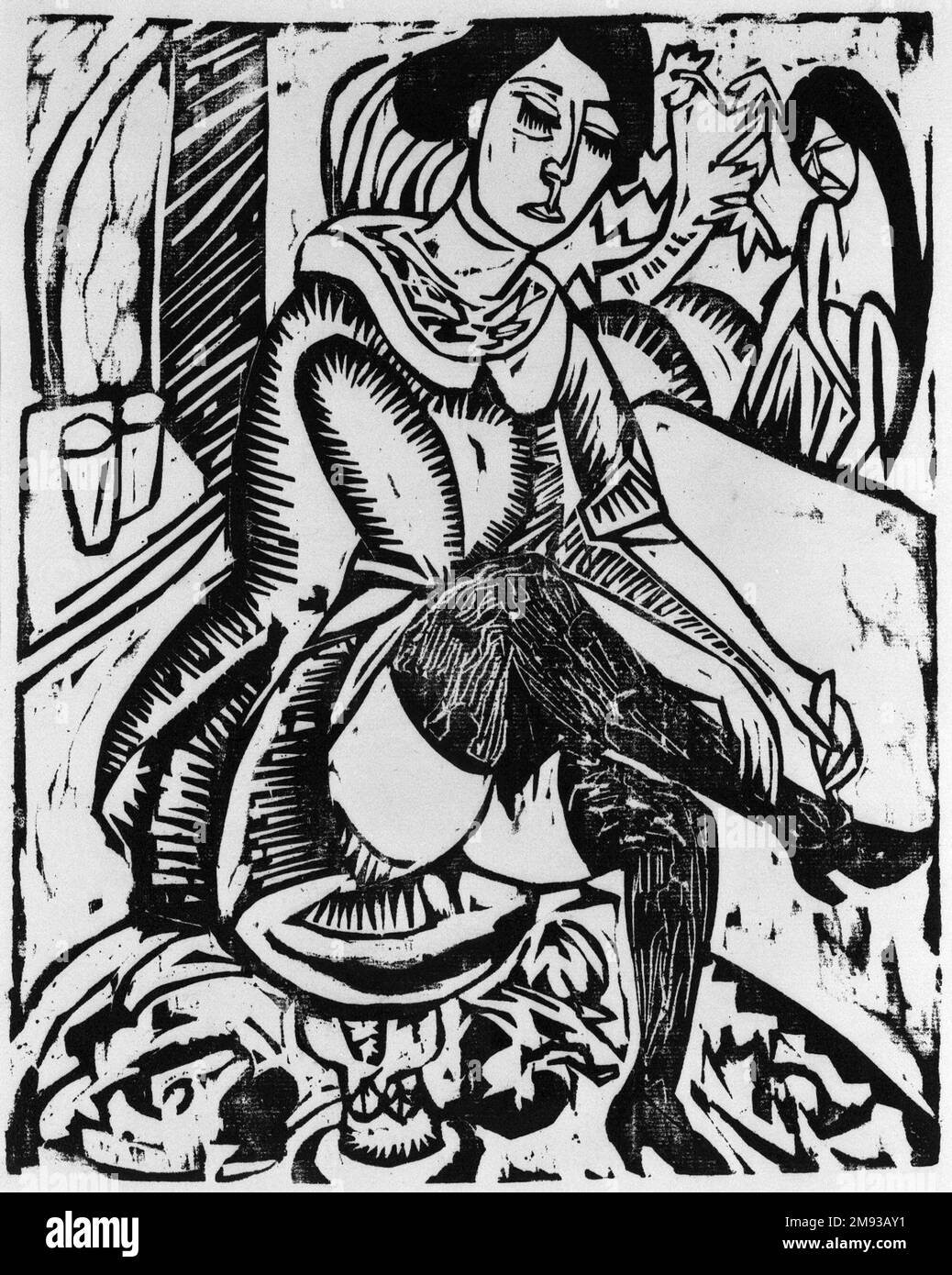 Woman, Tying Shoe (Frau Schuh zuknöpfend) Ernst Ludwig Kirchner (German, 1880-1938). , 1912. Woodcut on laid paper, Image: 12 1/8 x 9 7/8 in. (30.8 x 25.1 cm).   European Art 1912 Stock Photo