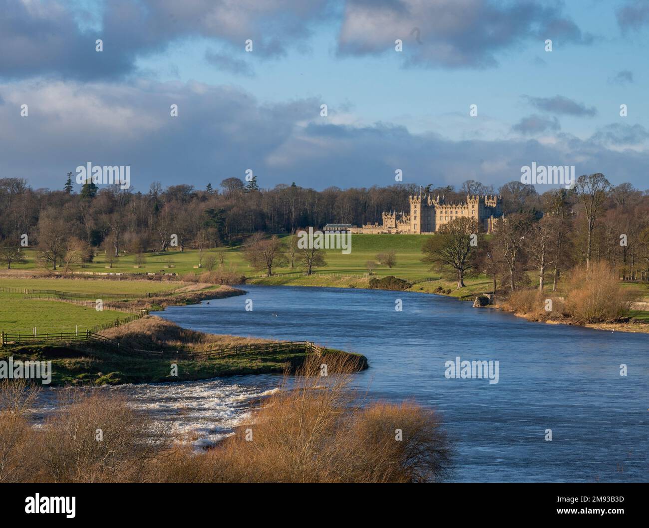 Scotland, Kelso  A view looking along the River Tweed towards Floors Castle in the distance at Kelso in the Scottish Borders, Scotland. UK.  Picture P Stock Photo