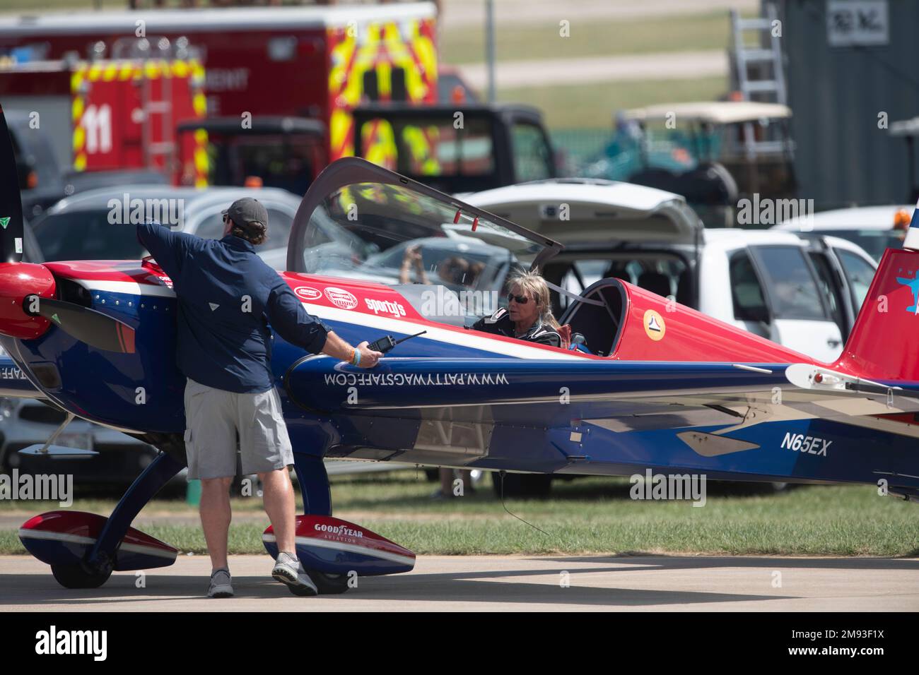 Oshkosh, WI - 27 July 2022: Patty Wagstaff sitting in her plane at an air show. Stock Photo