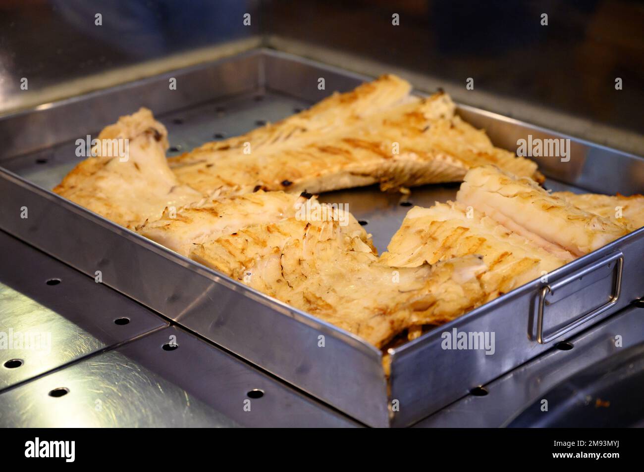 Cod Fish Salted Bacalhau Grilled On Olive Wood Firewood Grill In Small cod-fish-salted-bacalhau-grilled-on-olive-wood-firewood-grill-in-small