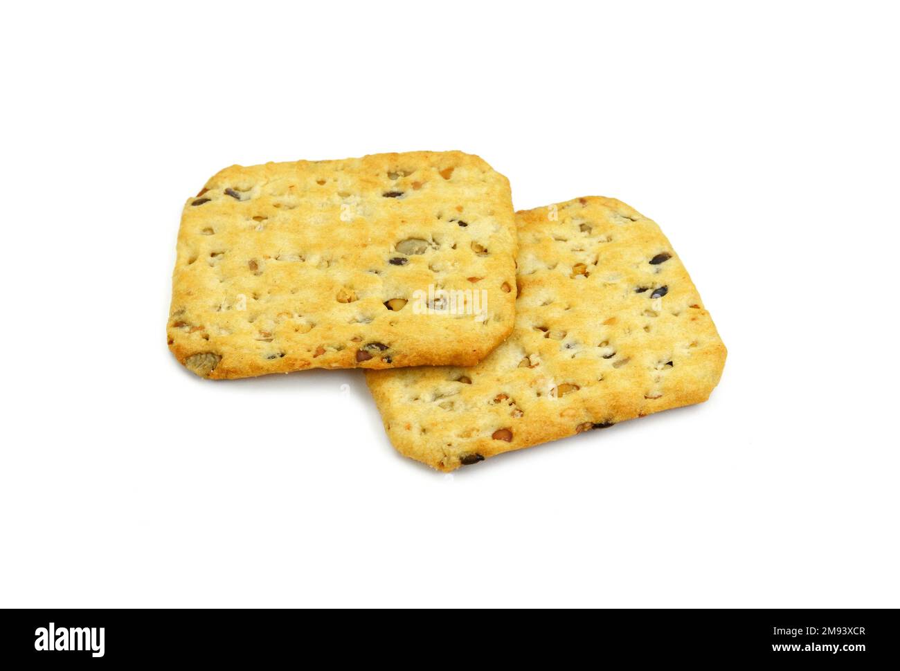 multigrain flatbread crackers isolated on a white background Stock