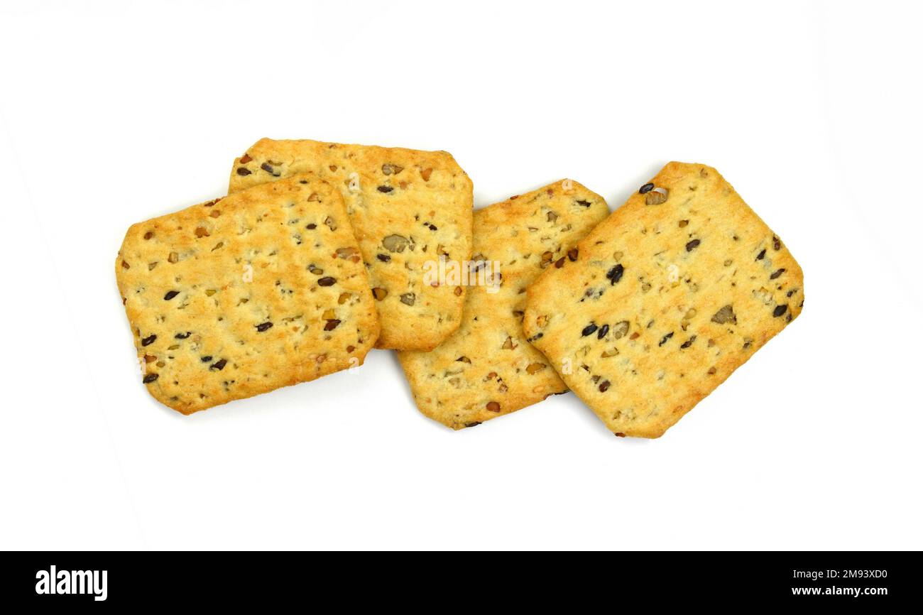 Top view of a group multigrain flatbread crackers isolated on a white