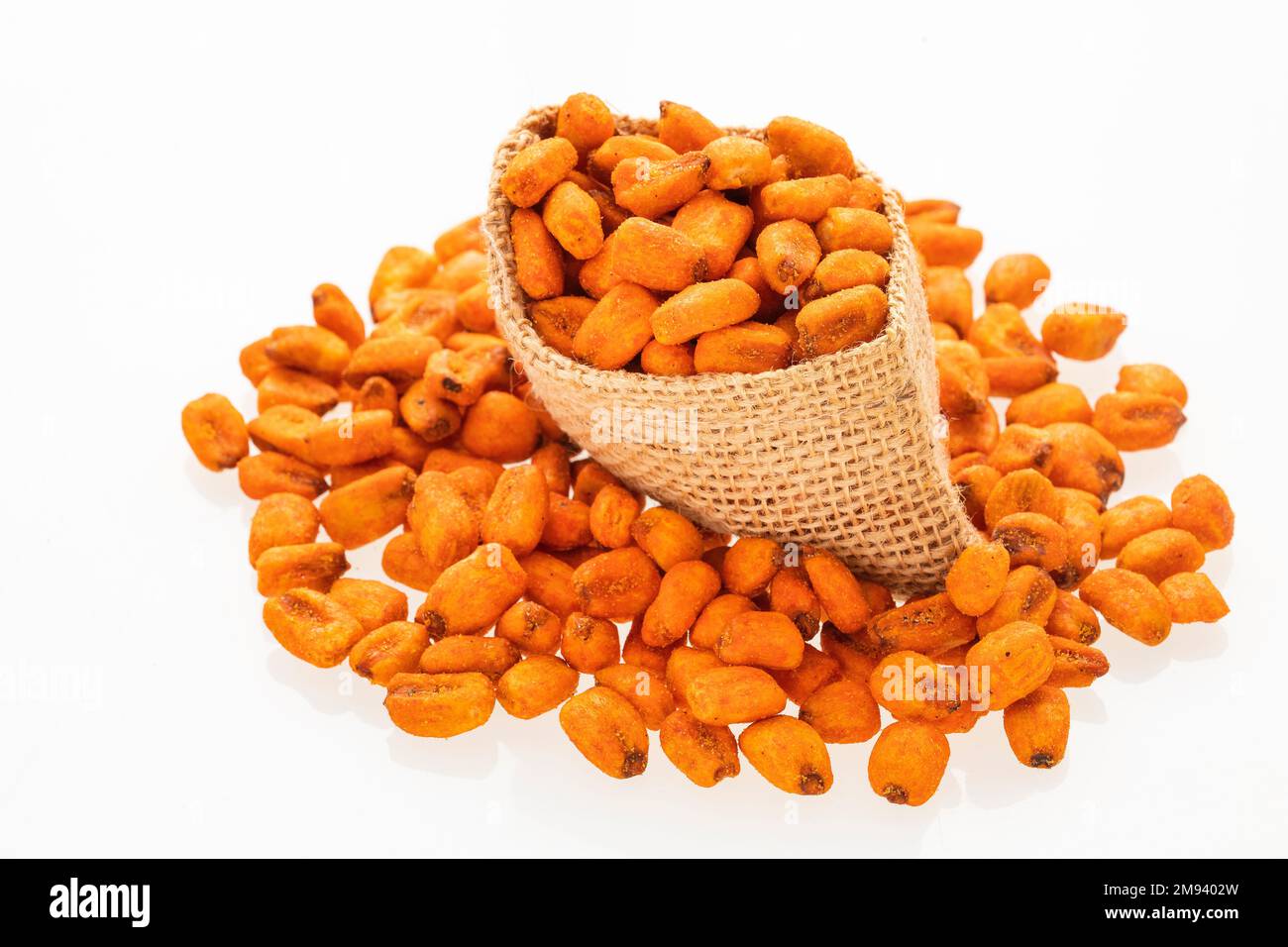 Chili salty corn crisp Zea mays. Toasted snacks in the burlap bag