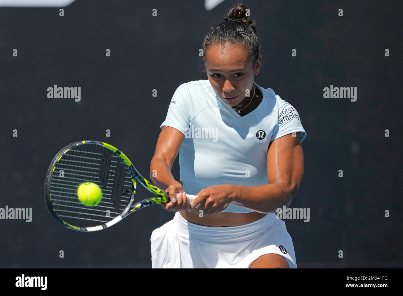 Leylah Fernandez of Canada plays a backhand return to Alize of