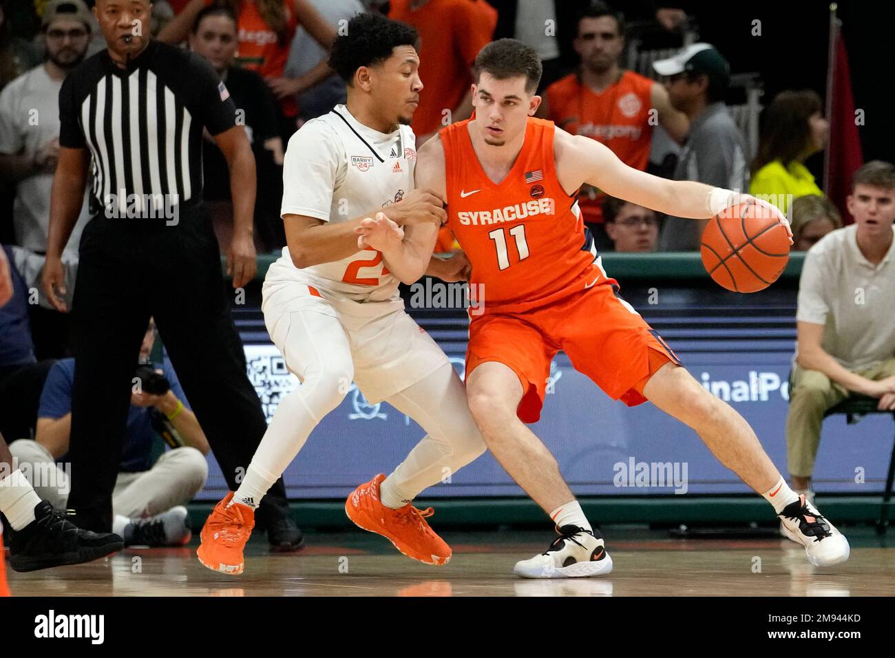 Syracuse guard Joseph Girard III (11) moves the ball as Miami guard