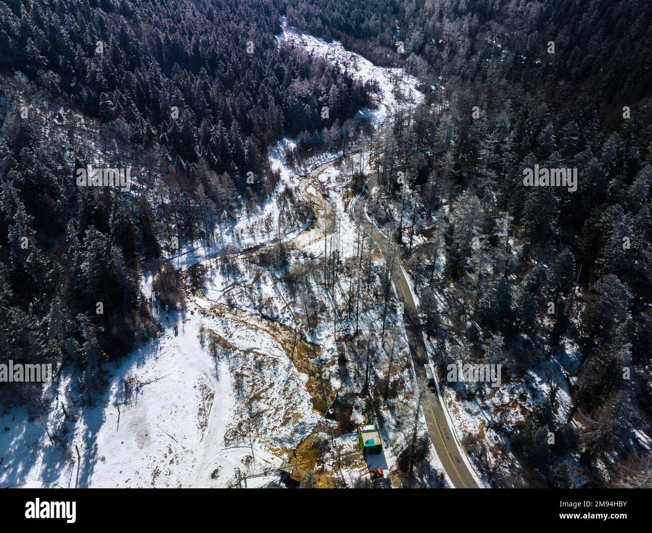 ABA, CHINA - JANUARY 15, 2023 - Aerial photo shows the Bipenggou scenic area after winter snow in Aba, Southwest China's Sichuan Province, Jan 15, 202 Stock Photo