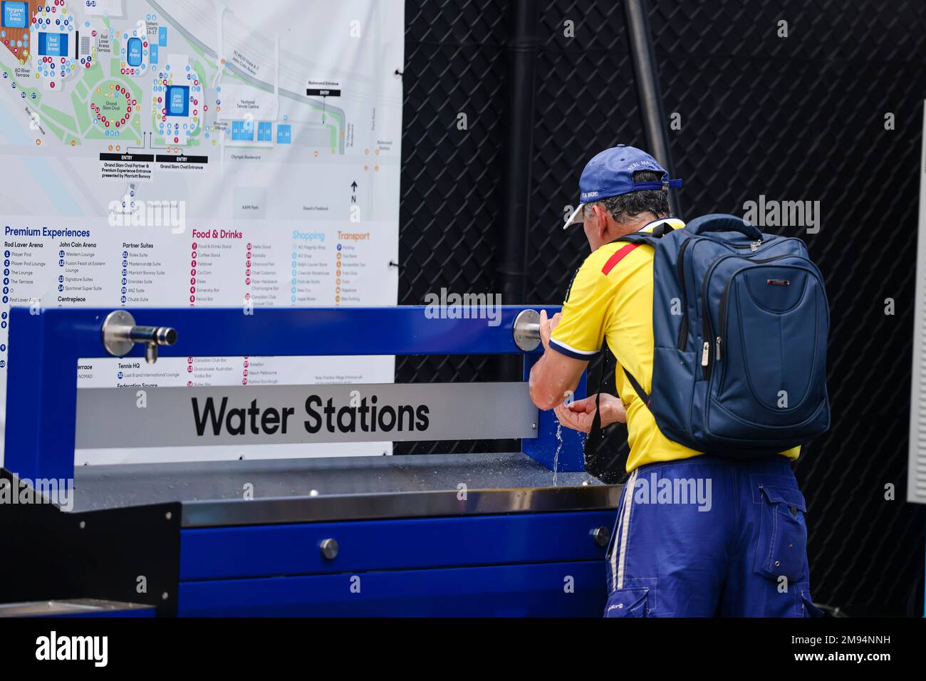 Melbourne, Australia. 17th Jan, 2023. A man drinks at a water station