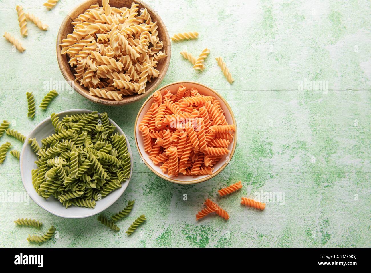 A variety of fusilli pasta made from different types of legumes, green and red lentils, mung