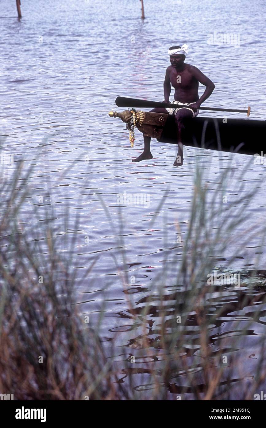 A boat rower sitting in the front edge of the palliyodam, Boat Race at Aranmula, Kerala, South India, India, Asia Stock Photo