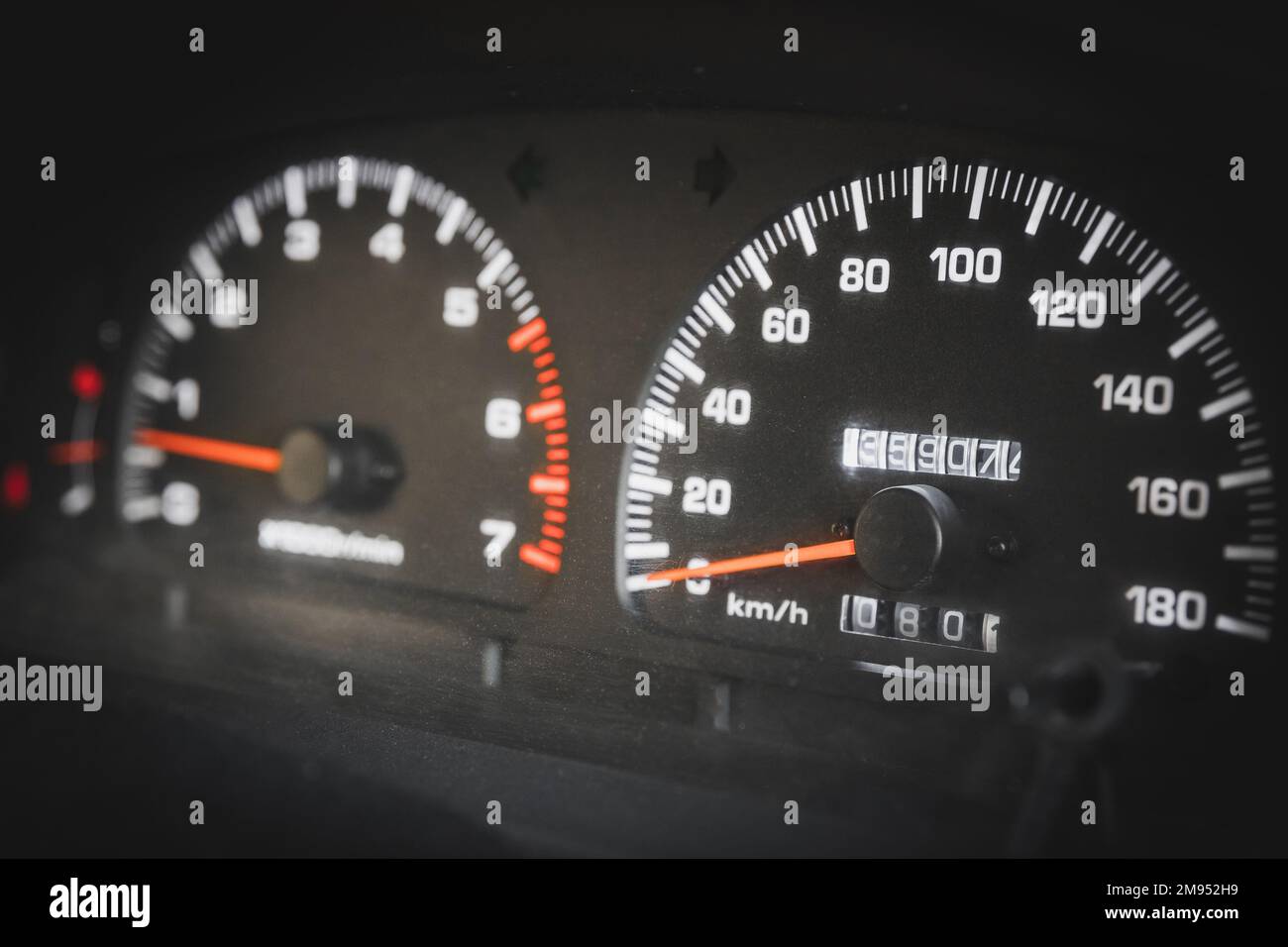 Closeup of a speedometer and tachometer in a used car Stock Photo Alamy