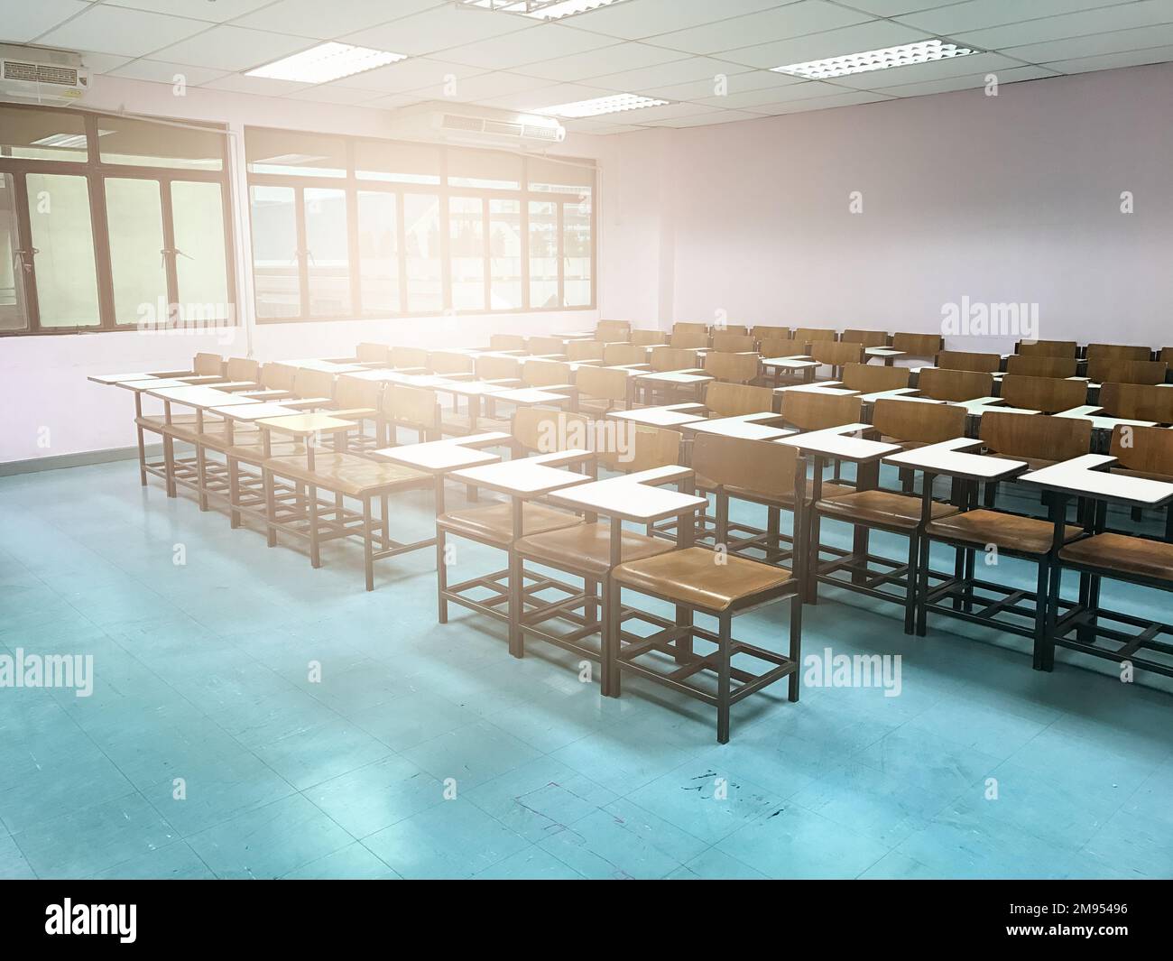 Wooden chairs in the classroom background Stock Photo - Alamy