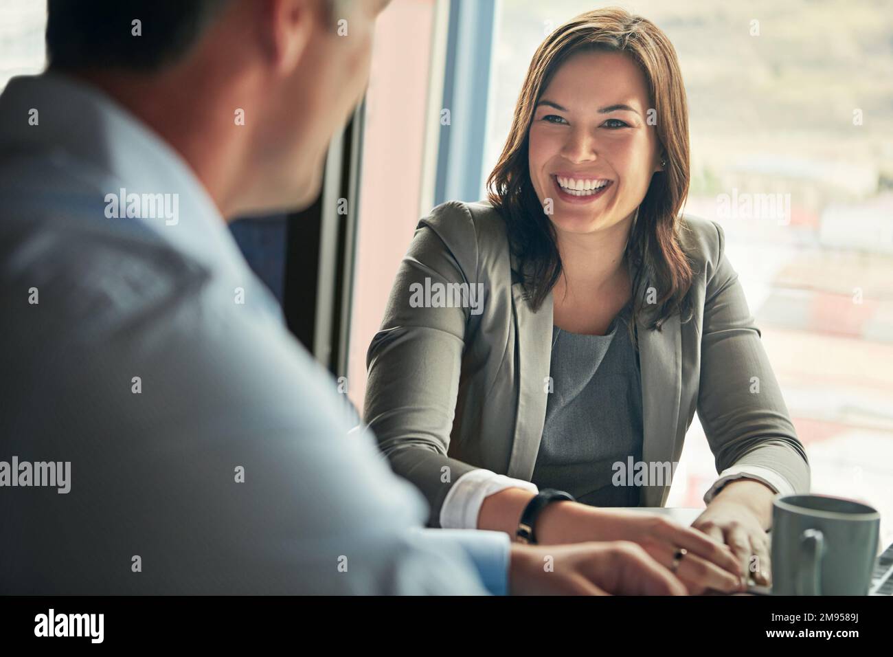Business people, partnership and meeting with corporate team, man and woman working together. Business discussion, partner and collaboration with Stock Photo