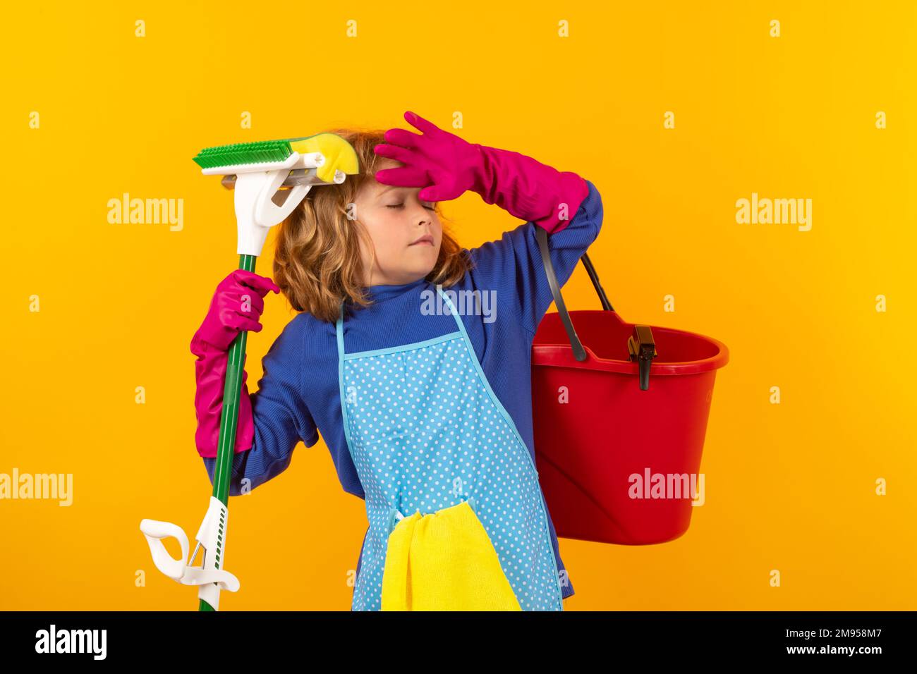Children helping with housekeeping, cleaning the house. Housekeeping at