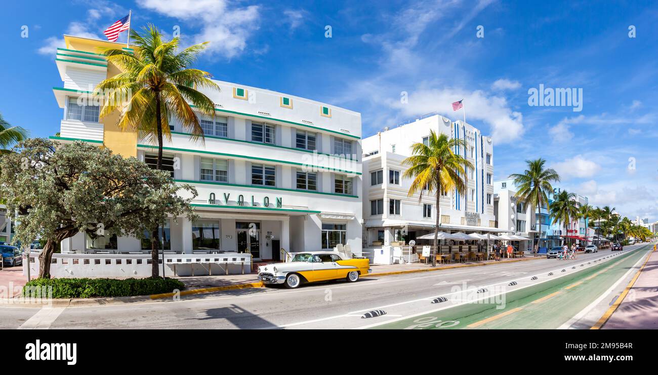 Miami Beach, United States - November 15, 2022: Avalon Hotel in Art Deco architecture style and classic car panorama on Ocean Drive in Miami Beach Flo Stock Photo