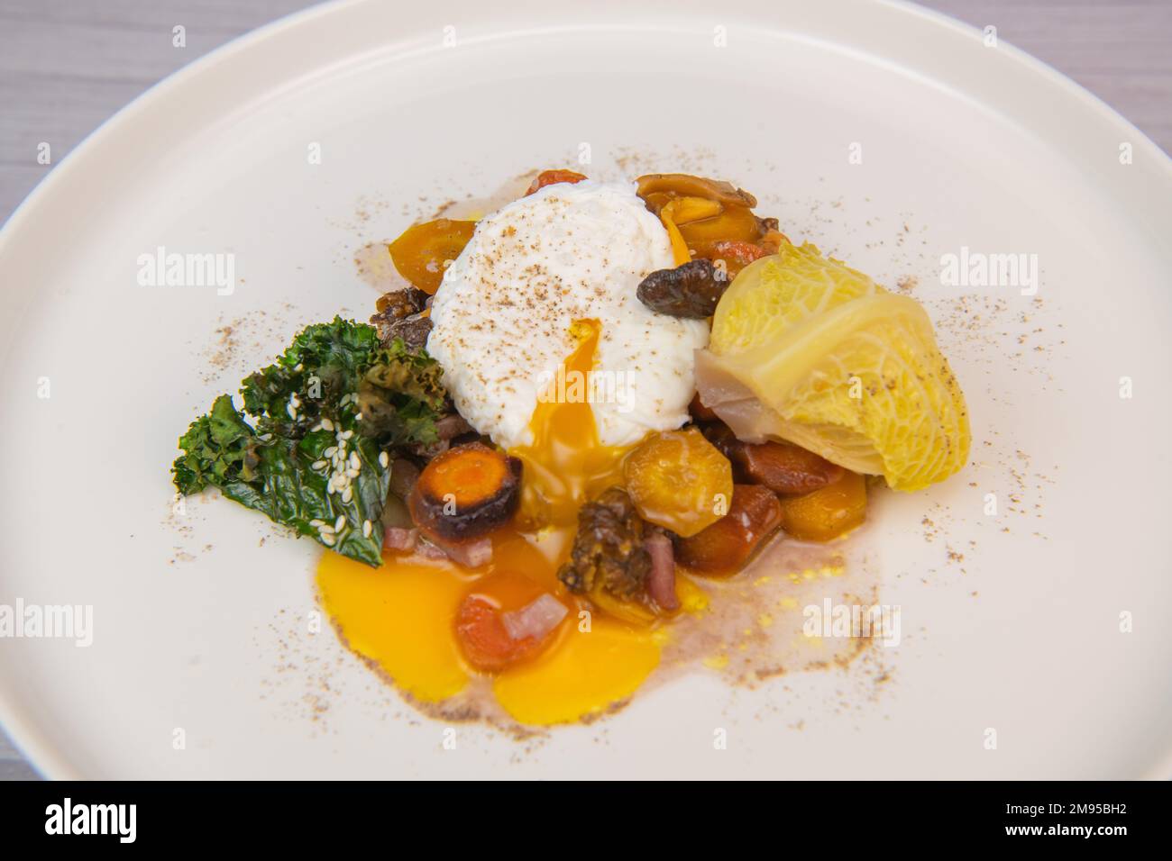 Recipe for braised cabbage, multicoloured carrots, onions, chanterelle