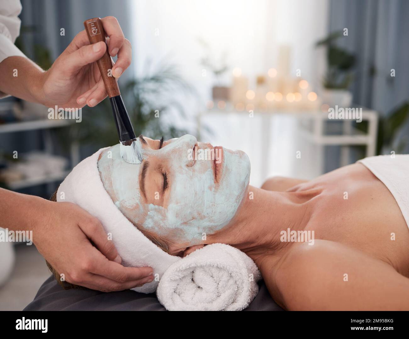 Deep cleanse to reveal a glowing, restored complexion. a mature woman ...