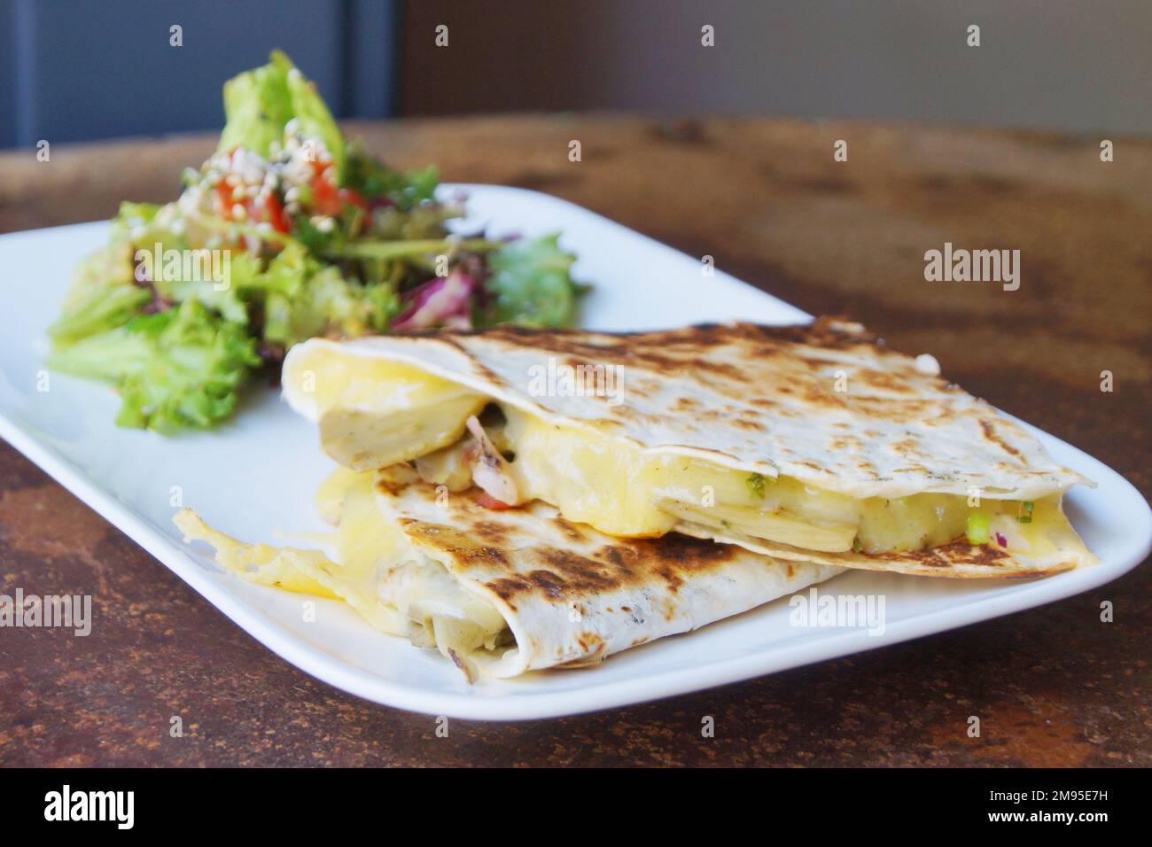 The quesadilla is a Mexican dish that consists of a corn or wheat