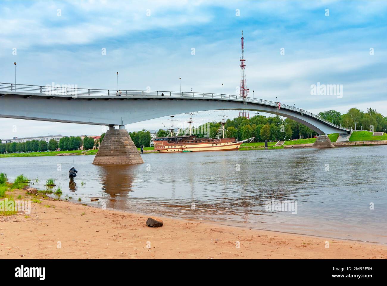 The city of Veliky Novgorod. Pedestrian (Humpback) bridge over the Volkhov River Stock Photo