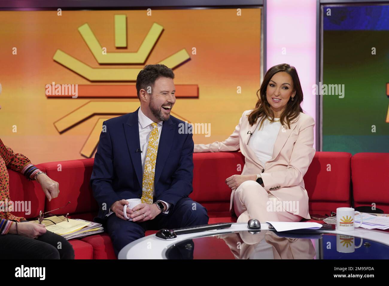 Presenters Jon Kay and Sally Nugent on the red sofa as BBC Breakfast celebrate its 40th anniversary with a special show and guests at MediaCityUK, Salford. Picture date: Tuesday January 17, 2023. Stock Photo