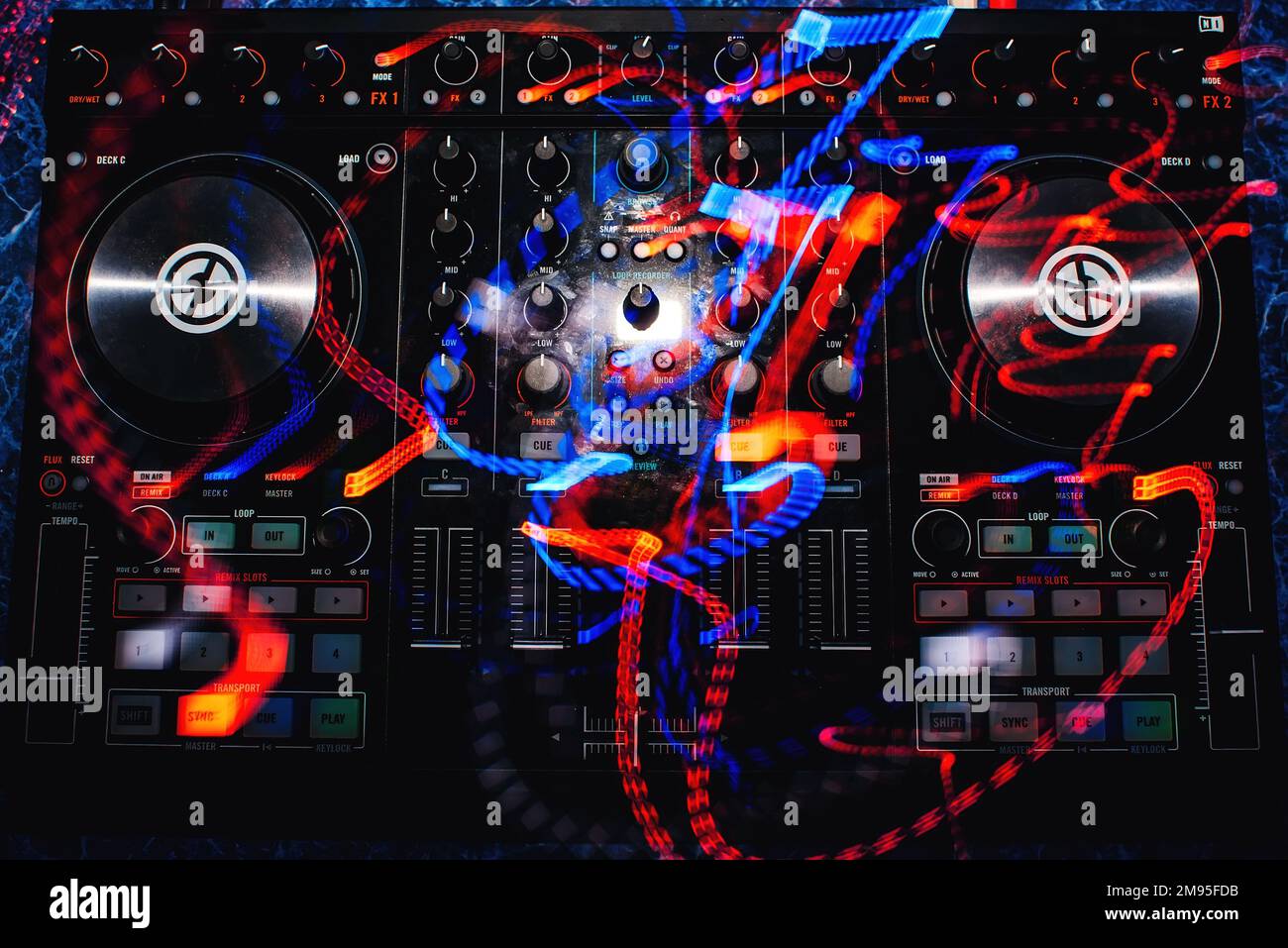 professional music mixer DJ with controllers and buttons with colored