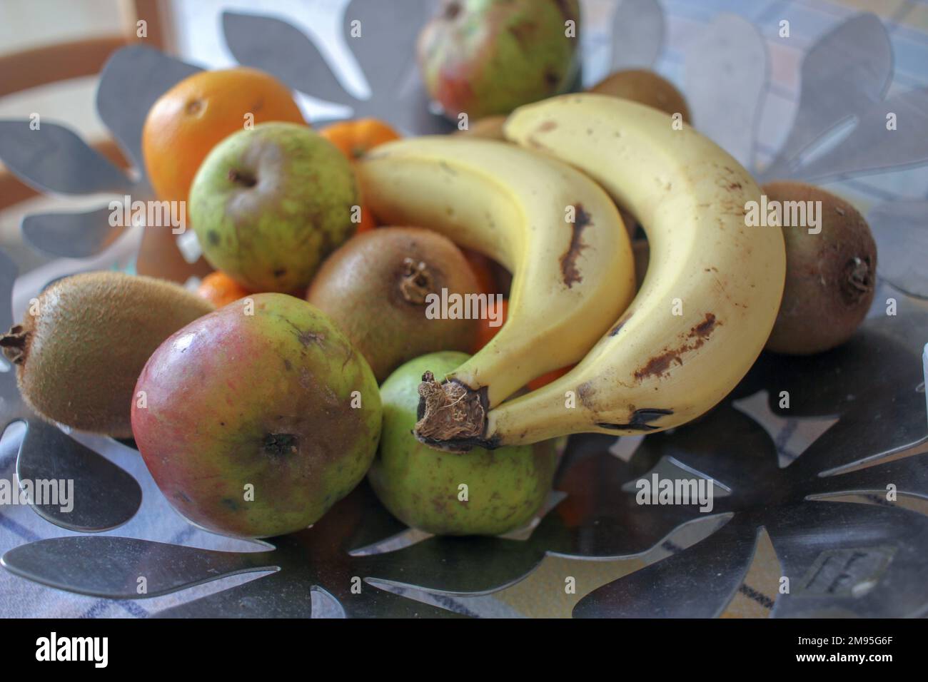 apple, kiwi, orange and banana in the fruit bowl Stock Photo - Alamy