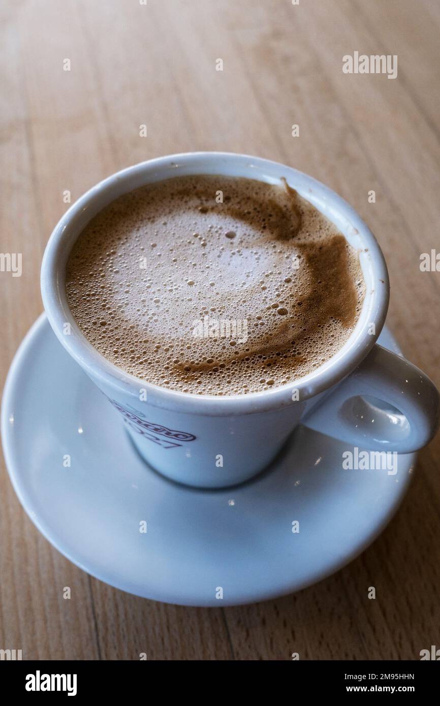 A close up closeup view of a fresh cup of Carraro coffee. Stock Photo